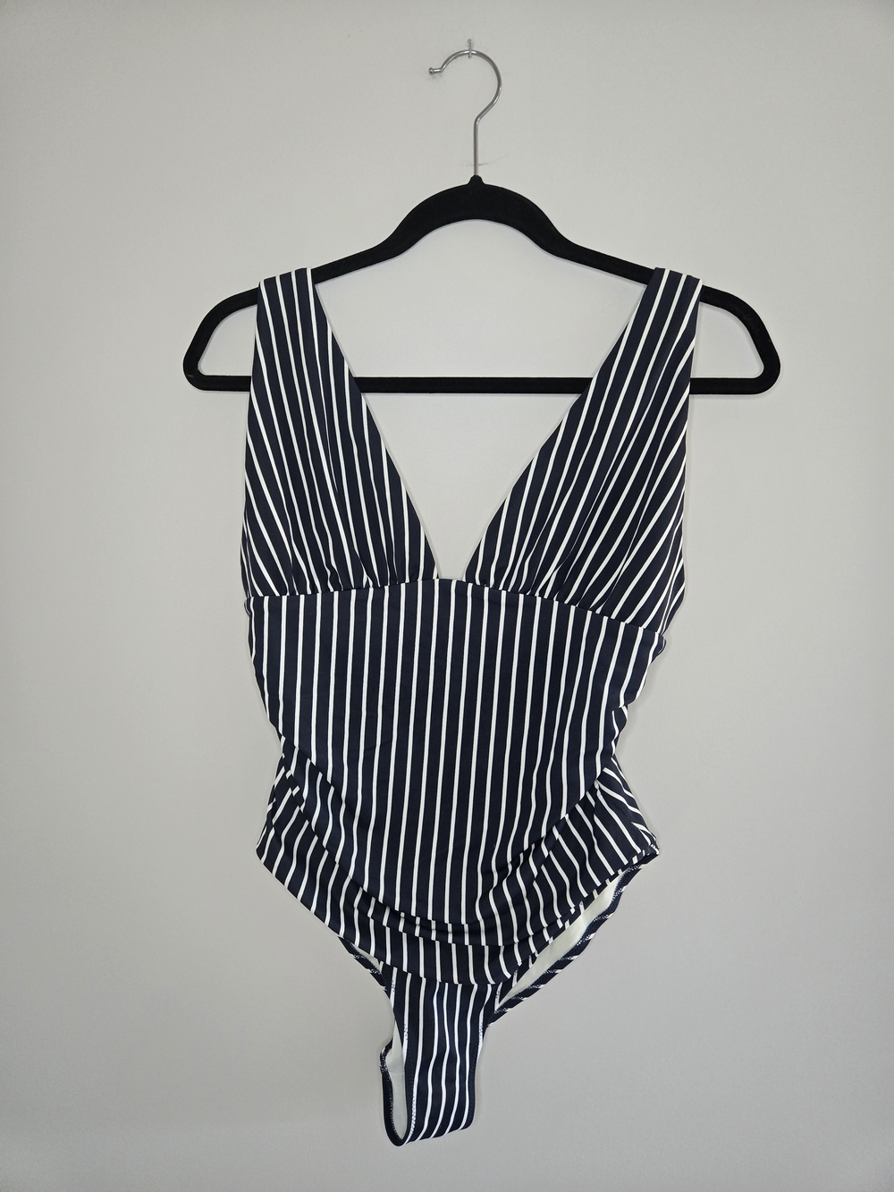 H&M vertical stripe navy + wgite v-neck one‑piece swim suit, adjustable straps